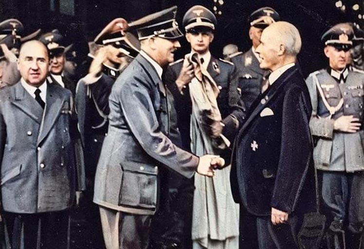Gustav Krupp receives the Golden Party Badge of the NSDAP from Adolf Hitler